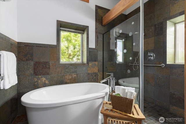 222 Rhodena Dr, Coupeville, WA 98239 - full bath featuring tile walls, a freestanding tub, a shower stall, and a wainscoted wall