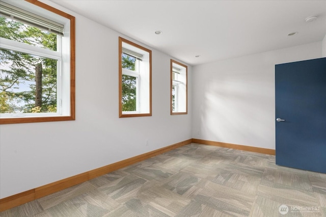 222 Rhodena Dr, Coupeville, WA 98239 - spare room featuring healthy amount of natural light and a smoke detector