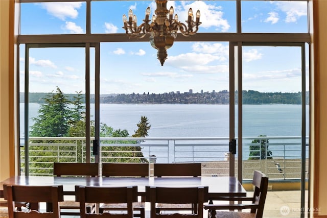 5511 104th Ave NE, Kirkland, WA 98033 - dining area with a water view and a chandelier