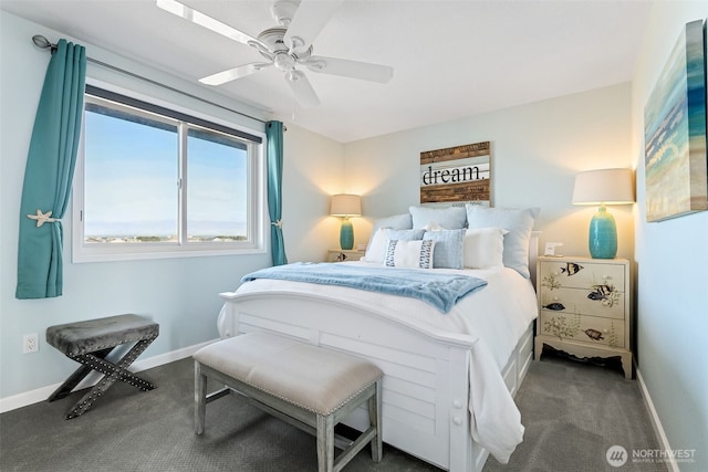 1311 Ocean Shores Blvd SW Unit 5, Ocean Shores, WA 98569 - carpeted bedroom featuring baseboards and ceiling fan