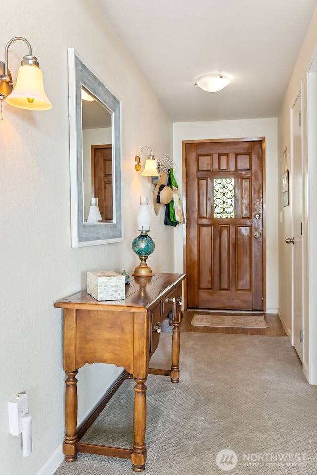 1311 Ocean Shores Blvd SW Unit 5, Ocean Shores, WA 98569 - foyer with carpet floors and baseboards