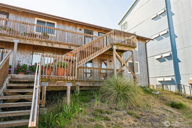 1311 Ocean Shores Blvd SW Unit 5, Ocean Shores, WA 98569 - back of house with stairway and a deck