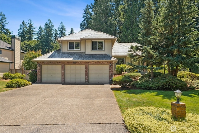 28314 180th Ave SE, Covington, WA 98042 - view of front of home featuring brick siding and an attached garage