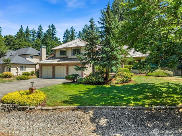 28314 180th Ave SE, Covington, WA 98042 - view of front facade featuring asphalt driveway, stucco siding, a garage, and a front lawn