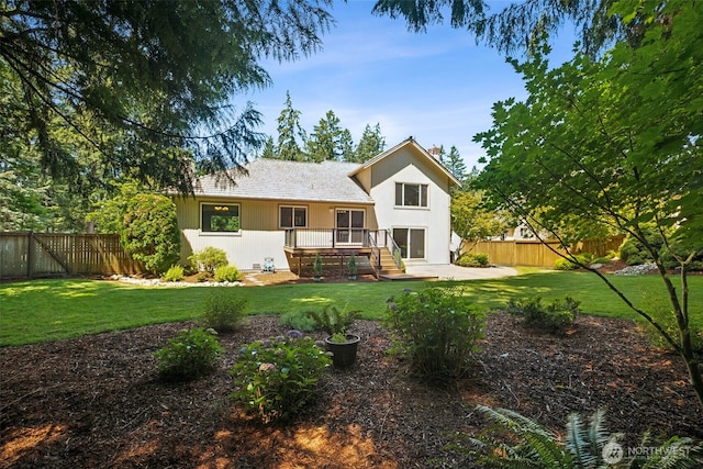28314 180th Ave SE, Covington, WA 98042 - back of property featuring a fenced backyard, a patio area, and a wooden deck