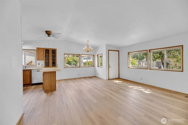 32820 20th Ave S Unit 35, Federal Way, WA 98003 - unfurnished living room with light wood-type flooring, a chandelier, plenty of natural light, ceiling fan, and lofted ceiling