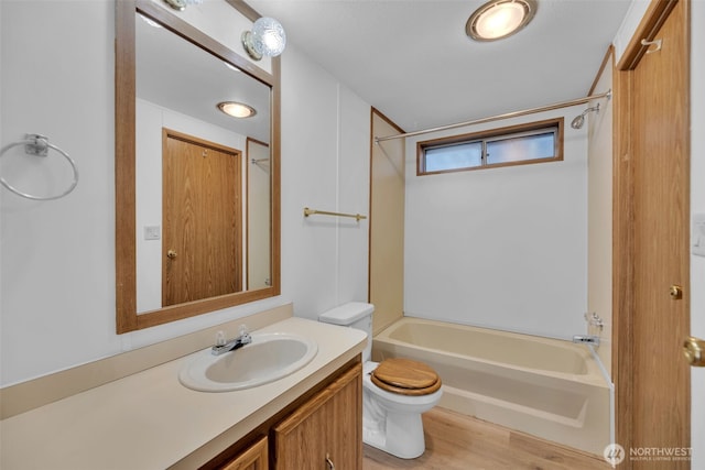 32820 20th Ave S Unit 35, Federal Way, WA 98003 - full bathroom featuring vanity,  shower combination, and wood finished floors
