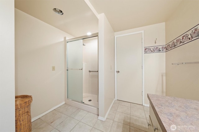 714 Canterbury Rd NW, Soap Lake, WA 98851 - bathroom with a stall shower, vanity, and tile patterned flooring
