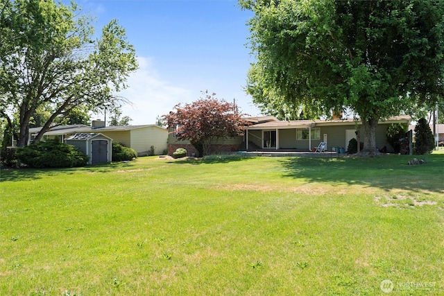 714 Canterbury Rd NW, Soap Lake, WA 98851 - view of grassy yard featuring a shed