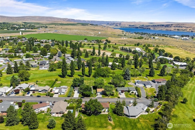 714 Canterbury Rd NW, Soap Lake, WA 98851 - aerial perspective of suburban area with a water and mountain view