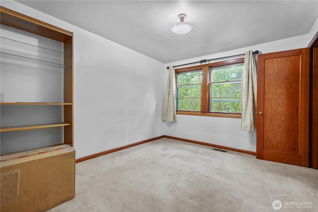 110 3rd Ave SW, Pacific, WA 98047 - unfurnished bedroom featuring carpet and baseboards
