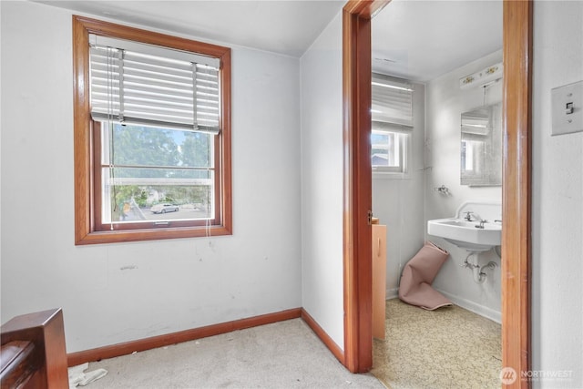 110 3rd Ave SW, Pacific, WA 98047 - bathroom featuring baseboards and a sink