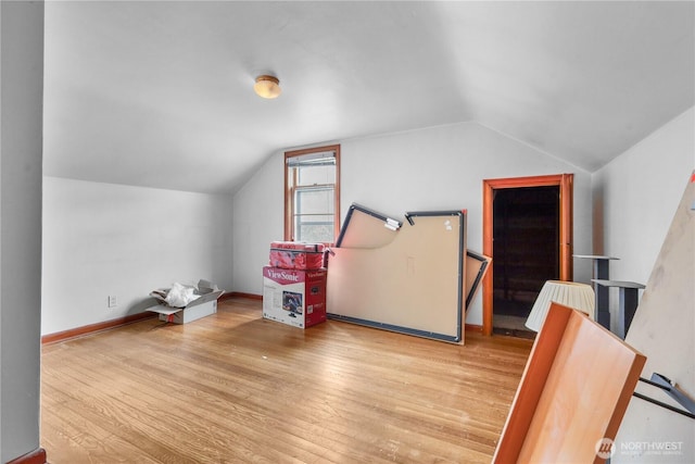 110 3rd Ave SW, Pacific, WA 98047 - additional living space with lofted ceiling and wood finished floors