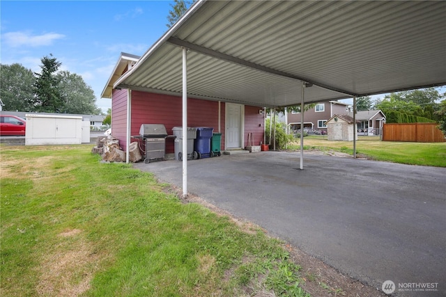 110 3rd Ave SW, Pacific, WA 98047 - view of car parking with a carport