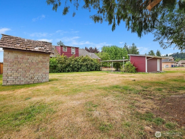 110 3rd Ave SW, Pacific, WA 98047 - view of grassy yard with an outbuilding