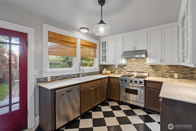 208 N Yakima, Tacoma, WA 98403 - kitchen featuring stainless steel appliances, under cabinet range hood, tile patterned floors, and plenty of natural light