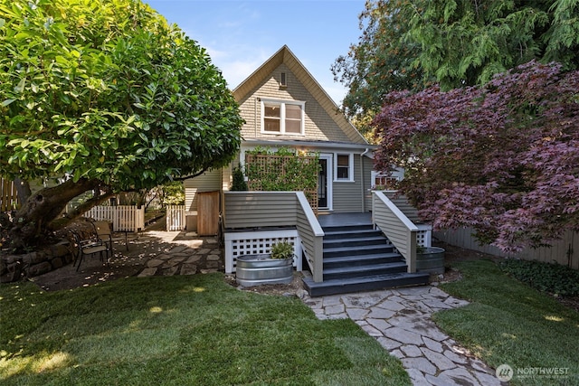 208 N Yakima, Tacoma, WA 98403 - rear view of house featuring stairway, a deck, and a patio