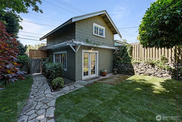 208 N Yakima, Tacoma, WA 98403 - rear view of property featuring french doors