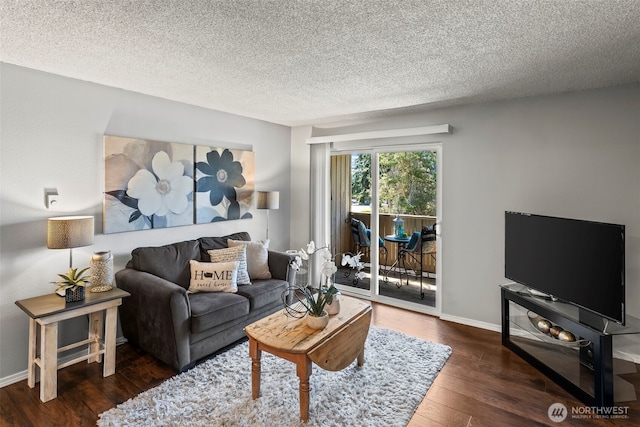 6105 N 16th St Unit N203, Tacoma, WA 98406 - living room featuring wood finished floors and a textured ceiling
