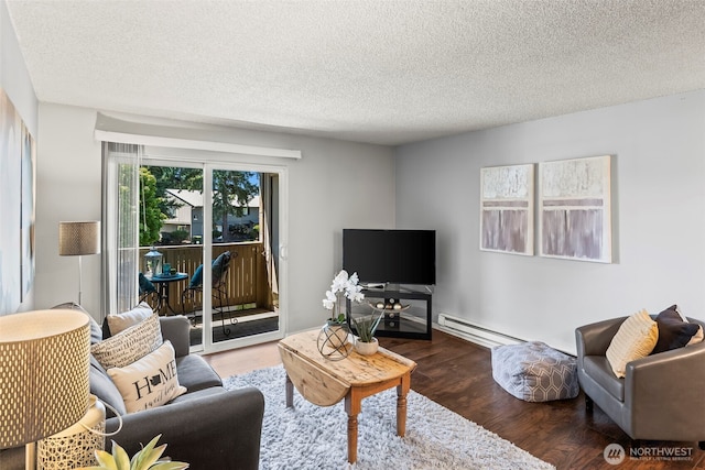 6105 N 16th St Unit N203, Tacoma, WA 98406 - living area featuring wood finished floors, baseboard heating, and a textured ceiling