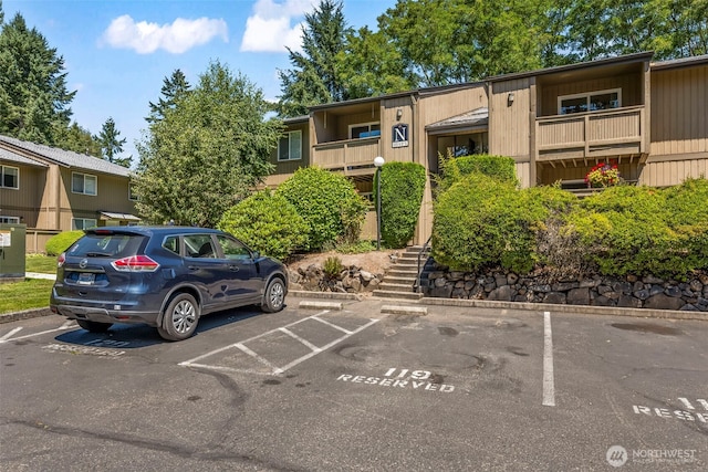 6105 N 16th St Unit N203, Tacoma, WA 98406 - uncovered parking lot featuring stairs