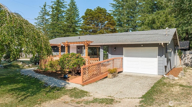 145 7th St, Gold Bar, WA 98251 - single story home with an attached garage, driveway, a shingled roof, and a pergola