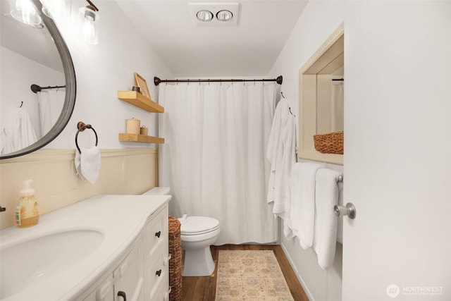 145 7th St, Gold Bar, WA 98251 - full bath with wood finished floors, vanity, and curtained shower