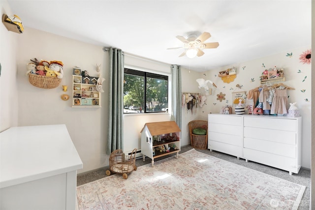 145 7th St, Gold Bar, WA 98251 - bedroom with carpet, a baseboard radiator, and ceiling fan