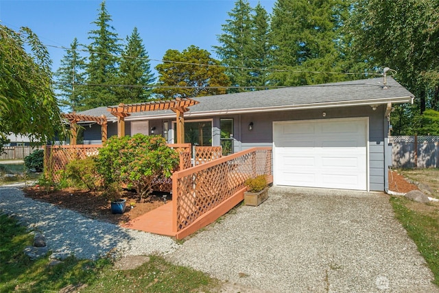 145 7th St, Gold Bar, WA 98251 - ranch-style home featuring a garage, gravel driveway, and a pergola