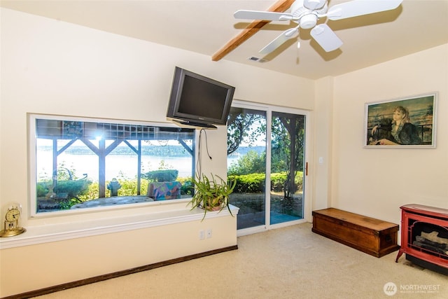 10125 Totem Way, Anderson Island, WA 98303 - living area with carpet floors and a ceiling fan