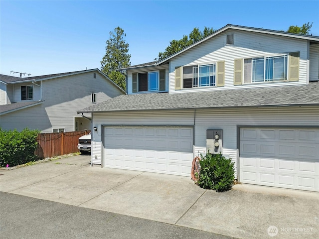 10421 19th Ave SE, Everett, WA 98208 - view of front of property featuring an attached garage, driveway, and roof with shingles