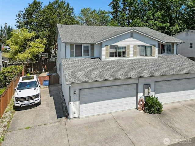 10421 19th Ave SE, Everett, WA 98208 - view of front of house featuring concrete driveway, roof with shingles, and a garage