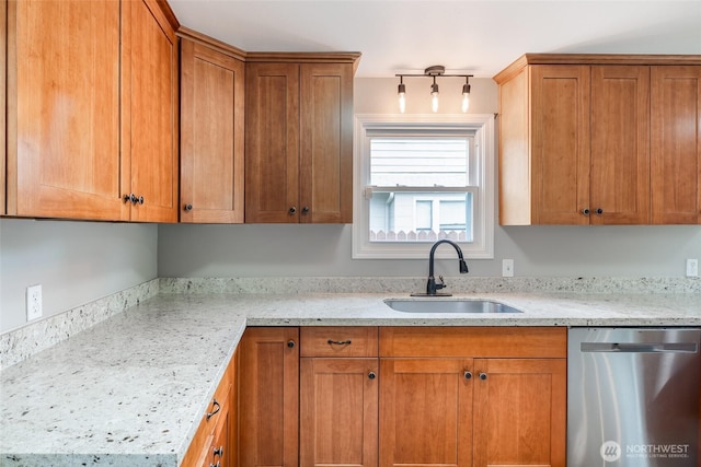 5030 S Park Ave S, Tacoma, WA 98408 - kitchen featuring dishwasher, brown cabinetry, and light stone counters