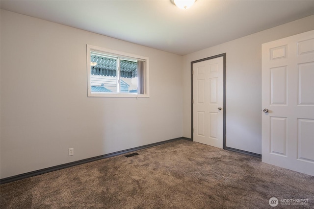 5030 S Park Ave S, Tacoma, WA 98408 - unfurnished bedroom featuring carpet flooring and baseboards