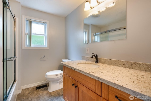 5030 S Park Ave S, Tacoma, WA 98408 - bathroom featuring vanity and enclosed tub / shower combo