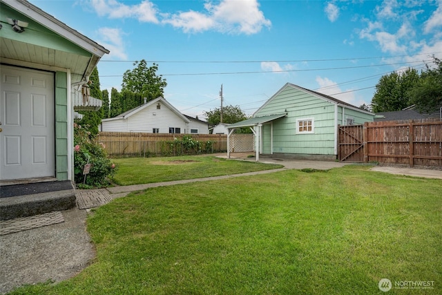 5030 S Park Ave S, Tacoma, WA 98408 - fenced backyard featuring a patio area
