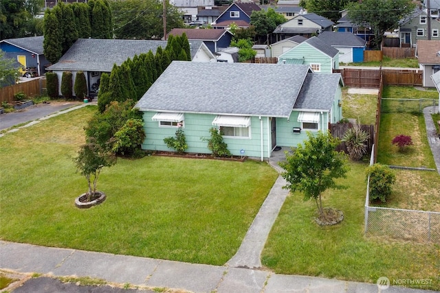 5030 S Park Ave S, Tacoma, WA 98408 - view of front of property featuring a shingled roof, a fenced backyard, and a residential view