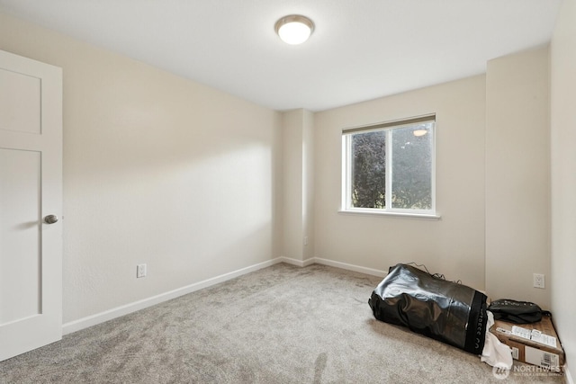 3806 Wetmore Ave, Everett, WA 98201 - spare room featuring carpet and baseboards