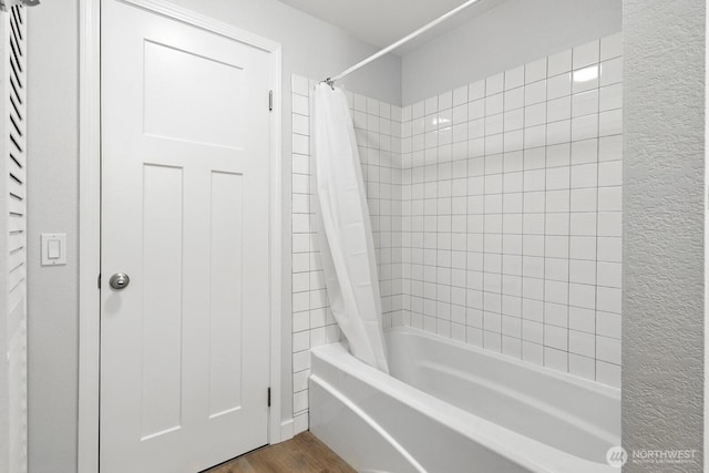 3806 Wetmore Ave, Everett, WA 98201 - bathroom featuring shower / bath combination with curtain and wood finished floors