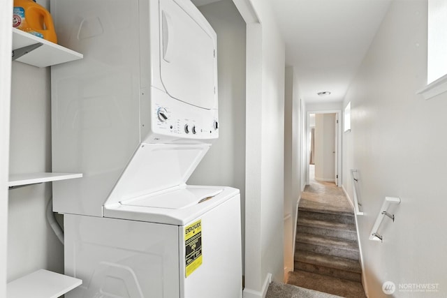 3806 Wetmore Ave, Everett, WA 98201 - washroom with stacked washer and clothes dryer and wood finished floors