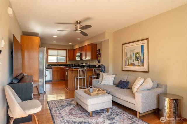 12723 35th Ave NE Unit B, Seattle, WA 98125 - living area featuring a ceiling fan, light wood-style flooring, and recessed lighting