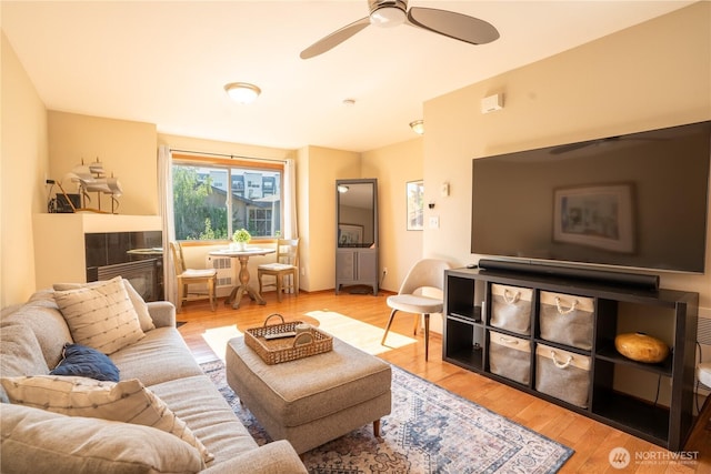 12723 35th Ave NE Unit B, Seattle, WA 98125 - living room with a ceiling fan and wood finished floors