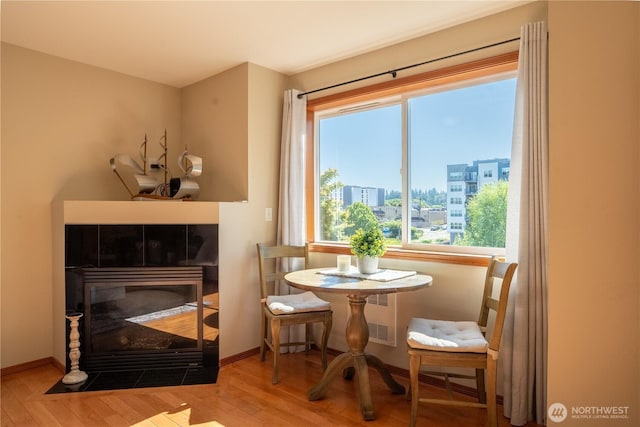 12723 35th Ave NE Unit B, Seattle, WA 98125 - dining area with wood finished floors and baseboards