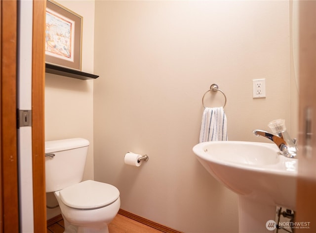 12723 35th Ave NE Unit B, Seattle, WA 98125 - bathroom featuring toilet and baseboards