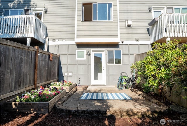 12723 35th Ave NE Unit B, Seattle, WA 98125 - rear view of property featuring a patio