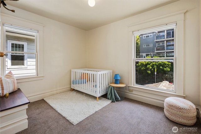 503 12th Ave E, Seattle, WA 98102 - carpeted bedroom featuring a crib