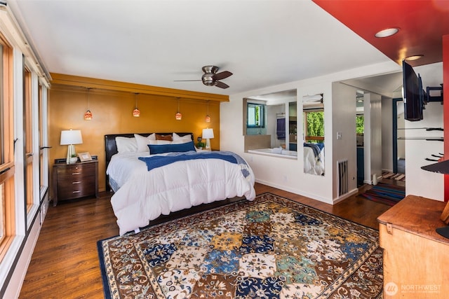 503 12th Ave E, Seattle, WA 98102 - bedroom with dark wood-type flooring and ceiling fan