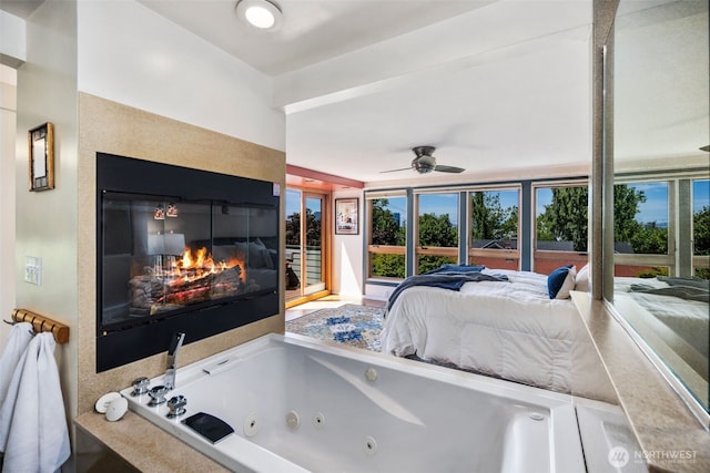503 12th Ave E, Seattle, WA 98102 - bedroom featuring a glass covered fireplace