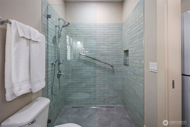 503 12th Ave E, Seattle, WA 98102 - bathroom with a shower stall and tile patterned flooring