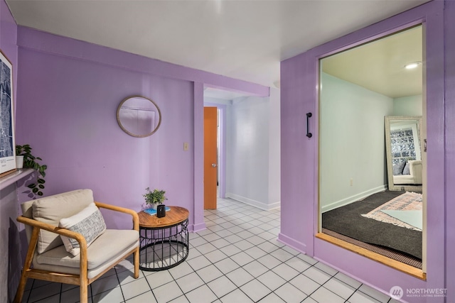 503 12th Ave E, Seattle, WA 98102 - living area featuring light tile patterned floors and baseboards